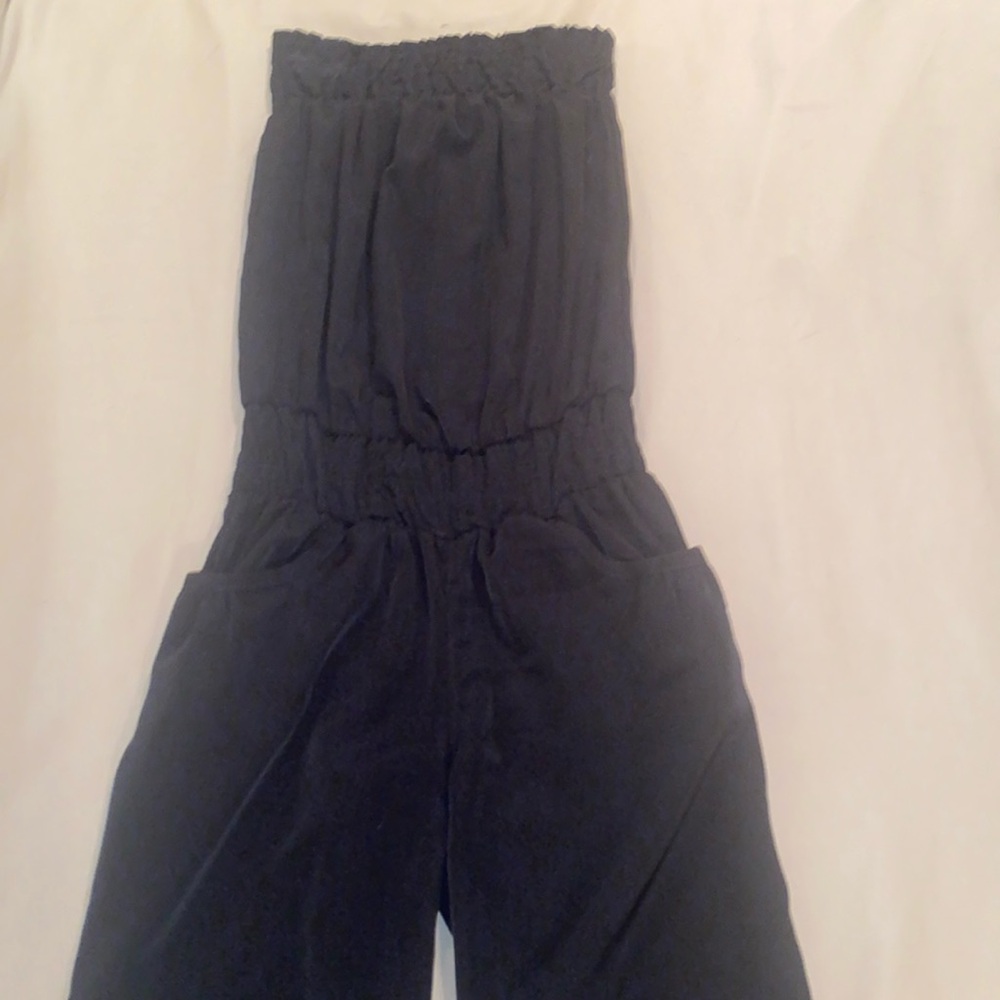 579 strapless Jumpsuits, beautiful and practically New, worn once,silky material
